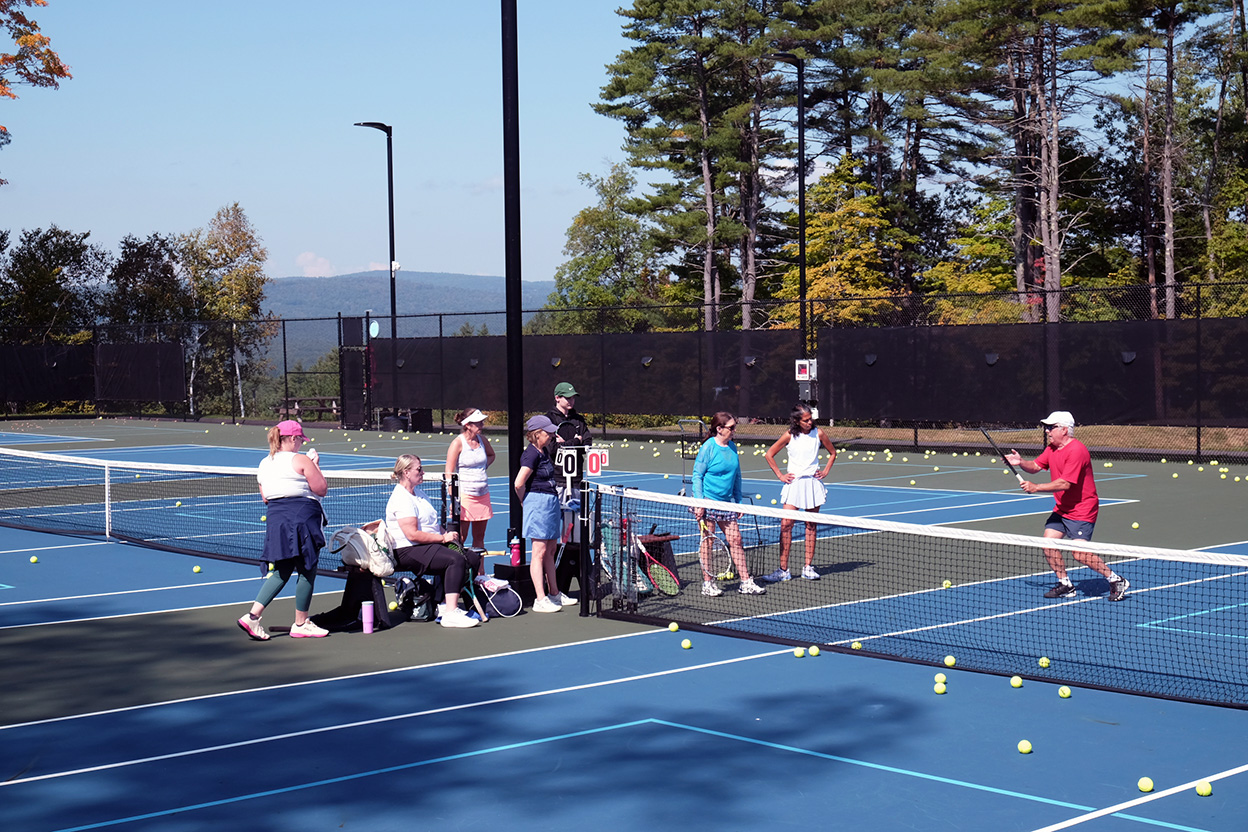 members playing pickleball