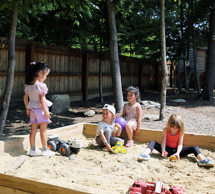 kids playing in sandbox