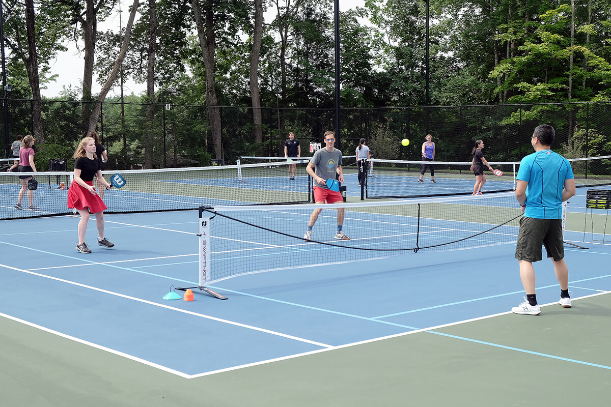 people playing on outdoor court